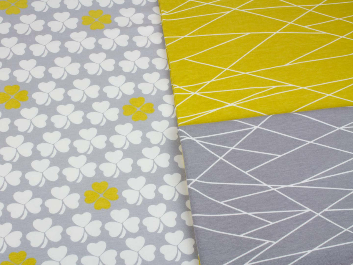 Sommer- Sweat-Stoff little lucky clover #gray-honey" (0,25 Meter)